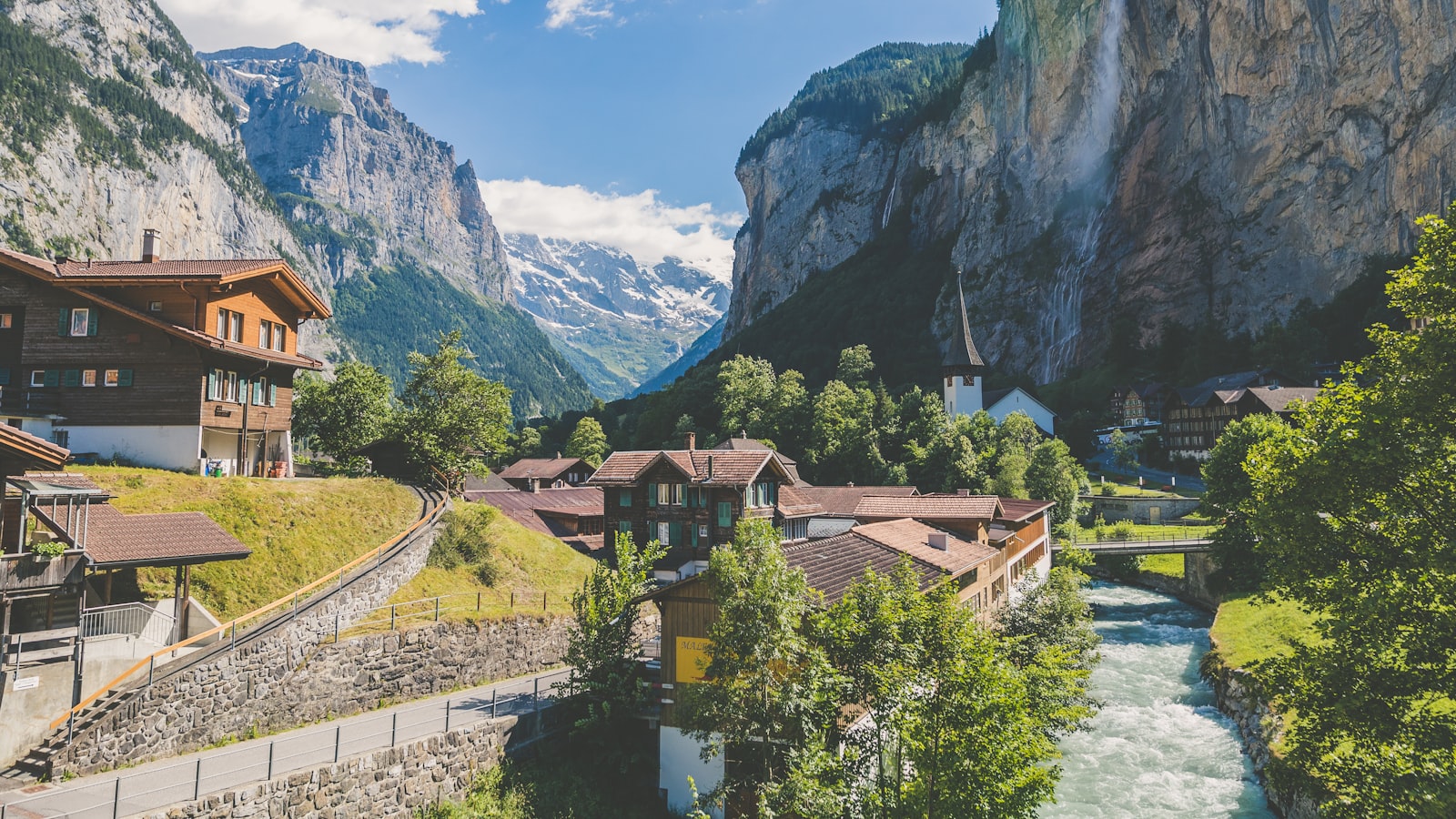 Swiss Alps with a mountain village - Switzerland-regulated Maclear versus Latvia's Mintos.